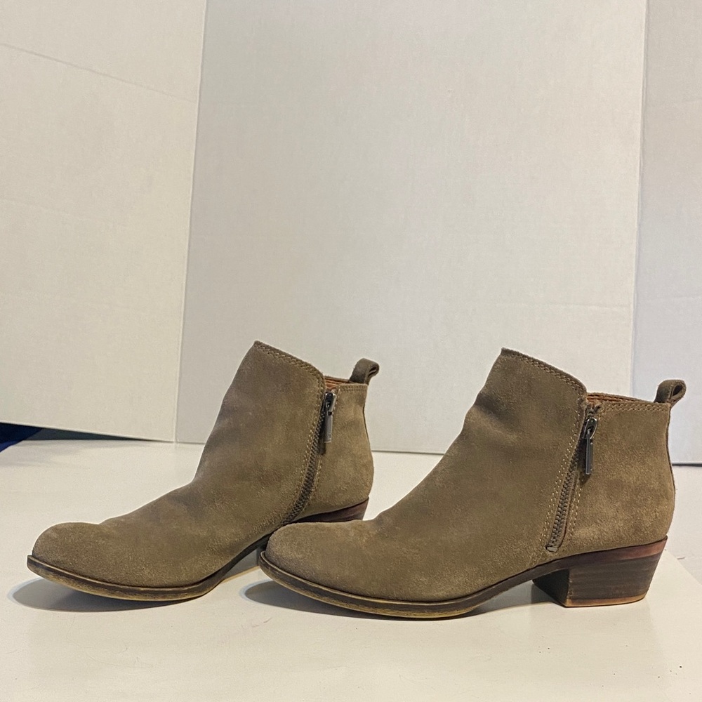 Lucky Brand taupe colored Ankle Booties. Grayish tan. Zip on both sides.